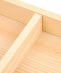 Detail of the interior of the Top Shelf Wooden Jewelry Tray With Four Spacious Slots For Rings And Chains.