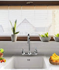 Wall Mount Commercial Kitchen Faucet With 8 Inch Center, 6 Inch Gooseneck Swivel Spout, Dual Handles, Brass Construction in a modern kitchen