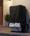 Heavy Duty Outdoor EV Charger Post Cover With Kickass Waterproof And Dustproof Shell For Secure Universal Fit And All Season Protection That Just Goes The Distance On Your Electric Car, matte black cover in use.