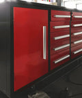 Rock Solid Ten Foot Heavy Steel Workbench And Tool Cabinet Featuring Fifteen Locking Drawers And Pre Cut Non Slip Liners For Your No Nonsense Garage Setup, side view with red cabinets.