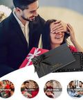 Man gifting a woman a Black Bling License Plate Frame Set For Women with a glitter diamond gift box