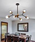 Six Light Glass Globe Chandelier With Adjustable Boom, Modern Semi Flush Mount Ceiling Fixture in dining room setting