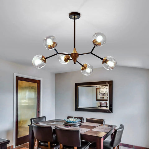 Six Light Glass Globe Chandelier With Adjustable Boom, Modern Semi Flush Mount Ceiling Fixture in dining room setting