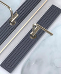 Premium Stone Faucet Mat For Kitchen Sink Heavy Duty Water Absorbing Splash Guard Fast Drying Countertop Protector Durable Non Slip Bathroom Drainage Pad showing dual faucet setup on a dark mat.