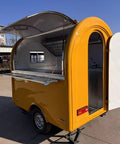 Road Ready Mobile Food Truck Trailer With Dope Commercial Kitchen Setup, yellow exterior, open door showcasing workspace.
