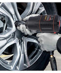 Robust Pneumatic Air Impact Wrench Delivers Ridiculous 450 Foot Pounds Pulling Power And Blistering 7500 Rpm Speed in use on a car wheel.