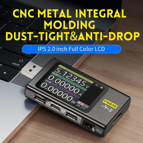 Beast USB Power Tester 4 To 28V 7A LCD Meter With USB A And Type C Ports Voltage And Current Readout sitting on laptop keyboard