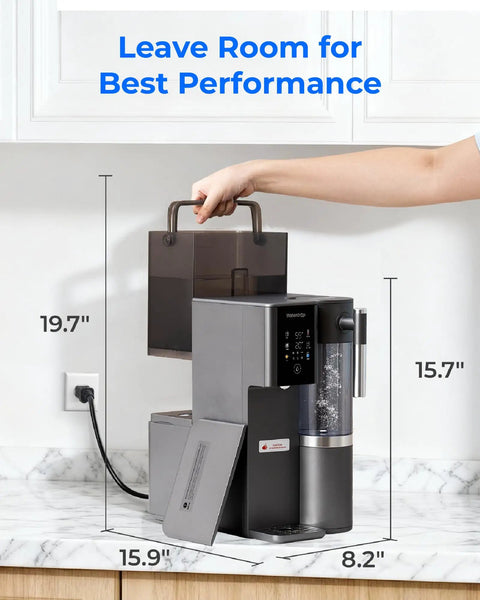 Person adjusting Mineral Rich A2G Countertop Reverse Osmosis System With Hot And Cold Water On Tap on kitchen countertop.