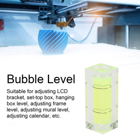 Small Spirit Level Square Bubble Level High Optical Transparency Material next to a 3D printer, demonstrating usage.