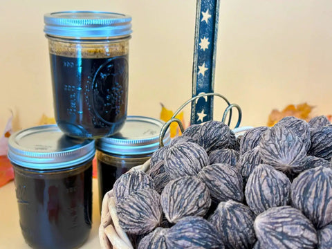Black Walnut Wood Stain 1 Pint Water Based Non Toxic Low Odor Rich Dark Tone in jars with walnut shells in a basket.
