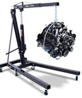Rock Solid 2 Ton Folding Engine Hoist Cherry Picker Shop Crane lifting a car engine with sturdy steel frame and wheels.