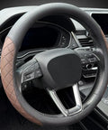 Kick It Up A Notch With Premium Nappa Leather Steering Wheel Cover Boasting Sharp Diamond Quilting For A Grippy Nonslip Feel That Keeps Your Hands Comfy During Every Long Haul Or City Commute In Smooth Black Brown Styling.