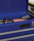 Lightweight Trim Puller Mini Multi Tool For Tight Spaces in a blue toolbox, showcasing its compact size and utility for quick trim removal