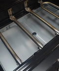 Interior view of a gas grill showing the installation area for a Grease Tray With Catch Pan For 24 To 30 Inch Gas Grills Universal Drip Pan Replacement For 4 And 5 Burner Models From Dyna Glo Nexgrill Kenmore Expert Grill BHG And More Budget Friendly.