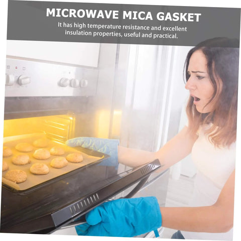 Woman using Ten Piece Microwave Crisper Sheets Made From Mica Foil For Heat Resistant Insulation Microwave Oven Accessory Pack