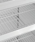 Internal view of shelves in Heavy Duty Two Door Merchandising Freezer Featuring Slick Black Panels And A Generous 53 Inch Profile.