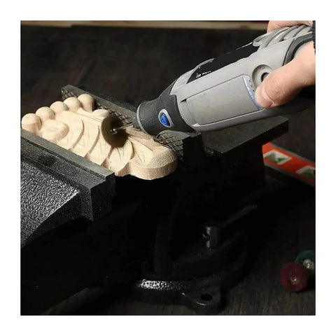 Must-Have 10-Piece Nylon Abrasive Wheel Kit With 120 To 600 Grit used on wood piece with rotary tool for detailing work.