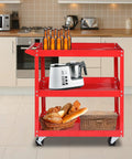 Beefy 3 Tier Rolling Tool Cart With 330 Lbs Capacity On Wheels For Garage Workshop Warehouse And Repair Shop Red Finish Durable Powder Coated Steel With Smooth Rolling Casters in a kitchen setting with kitchen items on top.