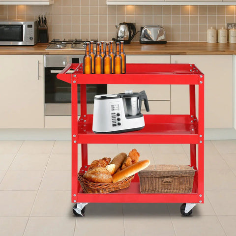 Beefy 3 Tier Rolling Tool Cart With 330 Lbs Capacity On Wheels For Garage Workshop Warehouse And Repair Shop Red Finish Durable Powder Coated Steel With Smooth Rolling Casters in a kitchen setting with kitchen items on top.
