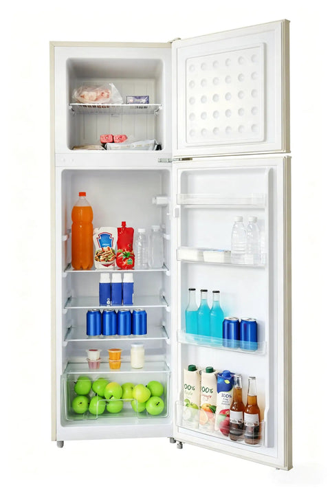 Inside view of Retro Apartment Refrigerator With Top Freezer And Ten Cubic Feet Of Solid Chill Storage featuring organized beverages and produce.