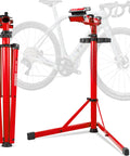 Upgraded Aluminum Bike Repair Stand With 176 Lb Capacity shown in red, featuring a foldable triangular base next to a road bike.