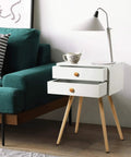 Killer White Industrial End Tables And Nightstands Set Of Two With Smooth Glide Drawers For Your Prime Bedroom Vibe Big Time Storage Bedside Side Tables Solid Wood Frame Totally Lightweight shown next to a green couch.