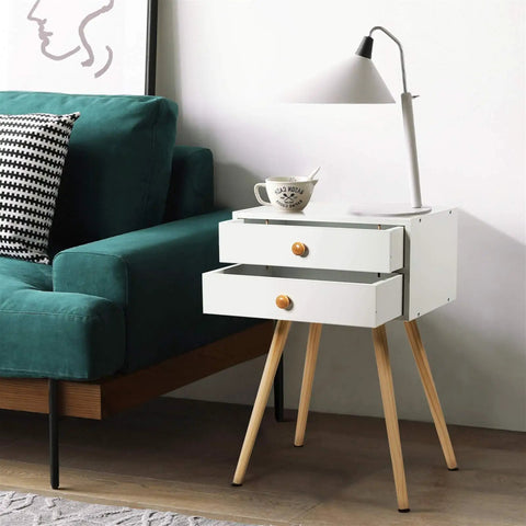 Killer White Industrial End Tables And Nightstands Set Of Two With Smooth Glide Drawers For Your Prime Bedroom Vibe Big Time Storage Bedside Side Tables Solid Wood Frame Totally Lightweight shown next to a green couch.