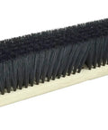 18 Inch Commercial Floor Broom With Black Polypropylene Bristles And Polystyrene Trim On A Lacquered Wood Handle, side view.