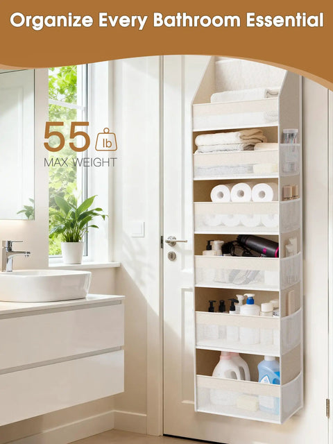 Over The Door Organizer That Turns Any Door Into A Storage Powerhouse With 6 Shelves And 13 Mesh Pockets, 55 LB Capacity For Baby Nursery, Bathroom, Bedroom Or Dorm, Beige hanging on a bathroom door, storing towels and toiletries.