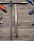 Replacement Jack Handle For Hydraulic And Bottle Jacks, Easy Lift Black Steel And Plastic Pole Lever on wooden surface