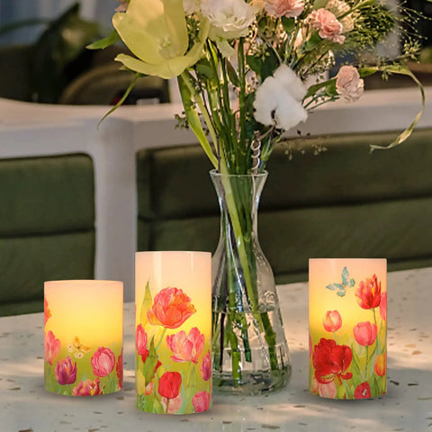 Flameless LED Candles With Remote Set Of 3 Real Wax Bunny Glass Decor on table next to floral vase, for home ambience.