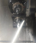 Close-up of 14 Piece Heavy Duty Coolant Nozzle Set For Cnc Lathe And Milling Rigs spraying coolant during machining.