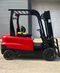 Heavy Duty Electric Forklift With Hydraulic Lifting Mast And Bulletproof Tires Workhorse Material Handler side view showing black and red design.