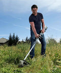 Man using AH1300 Replacement String Trimmer Head For Ego Power Plus ST1500 Series 15 Inch Trimmers in a grassy field