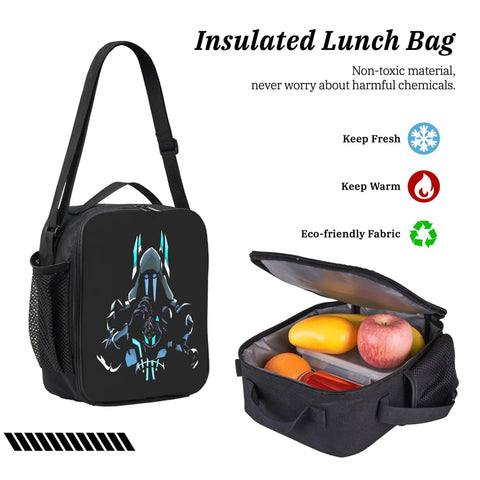 Insulated lunch bag with graphic design, open with fresh fruits inside, showcasing eco-friendly material and compartmental storage.