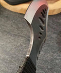 Close-up of the blade edge on a Beast Fixed Blade Axe Knife With Saw Back And Sheath For Camping Hiking Bushcraft Survival.