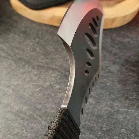 Close-up of the blade edge on a Beast Fixed Blade Axe Knife With Saw Back And Sheath For Camping Hiking Bushcraft Survival.