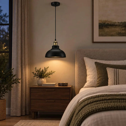 Black Industrial Metal Pendant Light, E26 Curvy Adjustable Ceiling Fixture hanging above a bedside table with decor.