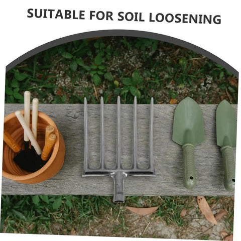 Heavy Duty Steel Garden Fork for Soil Loosening and Deep Soil Turning on wooden bench with garden tools