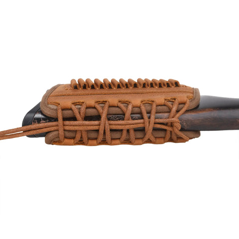 Rugged Leather And Canvas Gun Buttstock Cheek Rest Riser With Shell Holder For Scoped Rifle, brown color, side view, non-slip cushion.