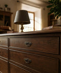 Wooden dresser with Antique Brass Ring Pulls Set Of 8 For Cabinets And Drawers With European Backplate, vintage style handles.