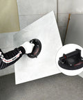 Heavy Duty Glass Suction Cup With Handle for Lifting Sheets, Windshields and Appliances in action lifting a tile.