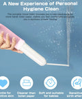 Hand holding pink and white On The Go Bidet Sprayer For Travel And Personal Hygiene Portable Electric Cleanser spraying water.