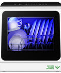 Hassle Free Portable Countertop Dishwasher With Six Smart Wash Cycles And Ultra Quiet Forty Decibel Operation For Smooth Apartment Living Without The Plumbing Headache, loaded with dishes inside.
