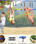 Kids playing on Backyard Kids Slackline Obstacle Course Kit With 65Ft Line And 13 Obstacles, Quick Install Buckles No Threading