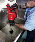 Cordless Drain Cleaning Air Gun Kit With Variable Pressure Control And Quick Swap Auger Tips For Sinks Toilets And Drains quickly unblocks nasty pipe clots fast being used in a sink.
