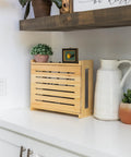 Rustic Pine WiFi Router Storage Box With Wall Mount Decorative Modem Shelf Hider And Cable Management System Keeps Your Router Looking Slick Up To 11 Inches Tall Easy Home Organization For Modern Living on a kitchen counter with plants and decor.