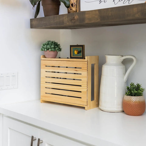 Rustic Pine WiFi Router Storage Box With Wall Mount Decorative Modem Shelf Hider And Cable Management System Keeps Your Router Looking Slick Up To 11 Inches Tall Easy Home Organization For Modern Living on a kitchen counter with plants and decor.