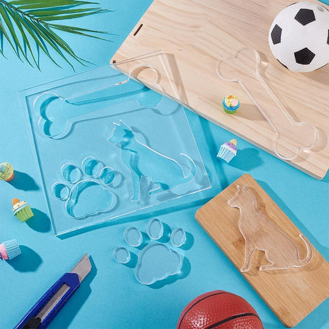 Clear Acrylic 3 In 1 Dog Bone And Paw Router Template Set For Woodworking No Fuss Reusable Jig Stencils For DIY Projects Bee Inlay Inspired Craft Templates 7.8 Inch Square 6mm Thick on blue surface with craft tools