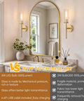 Set Of Two Rechargeable Battery Operated Wall Sconces Featuring Gold Glass Shades, sleek design above bathroom sink.